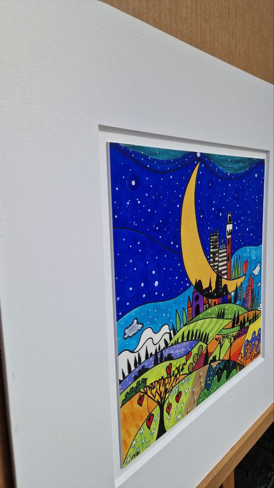 La luna abbraccia Siena